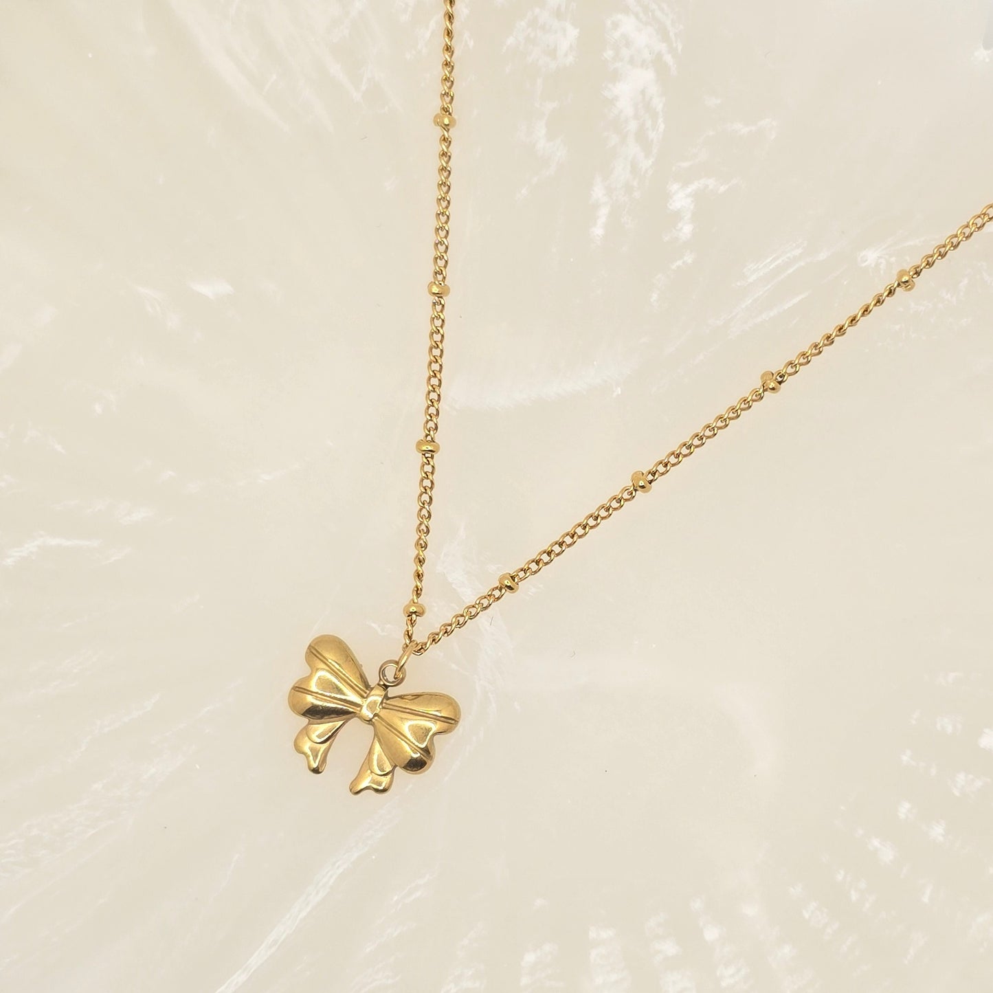 dainty gold bow necklace gift idea