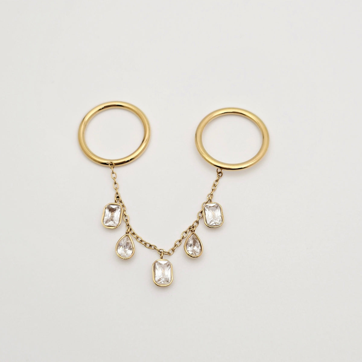 dainty gold waterproof rings with chain detail dangling cz