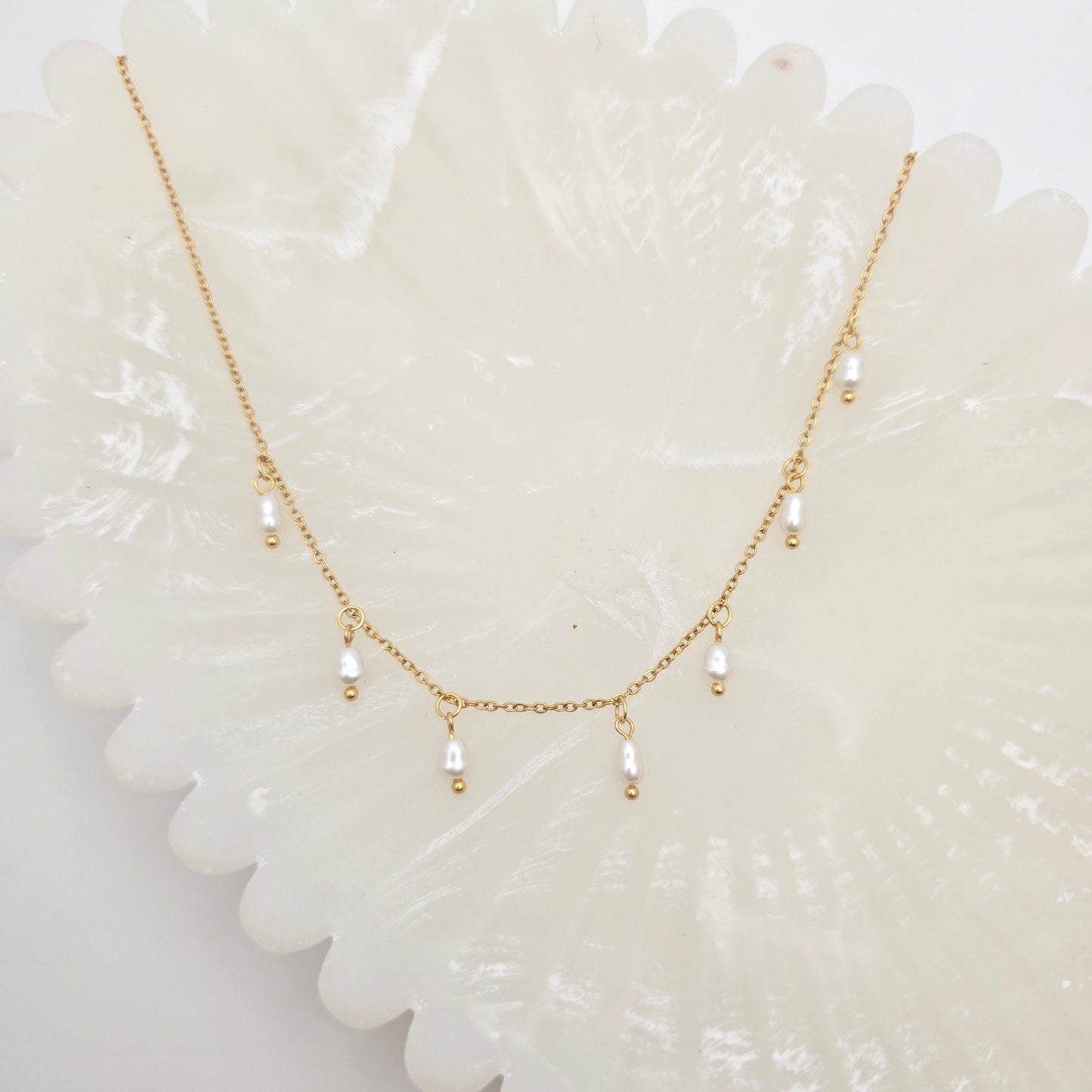 dainty gold pearls necklace layering