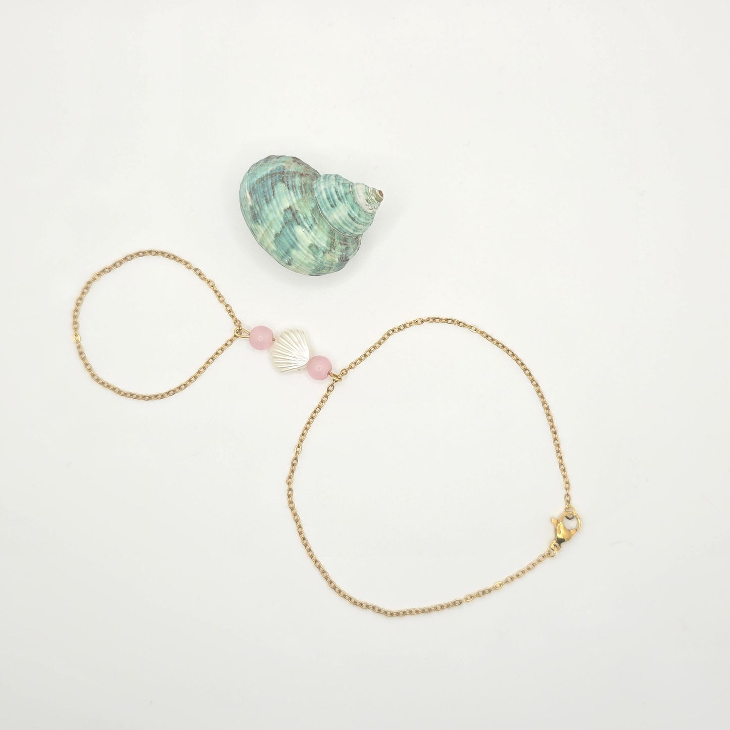 delicate pink shell gold hand chain