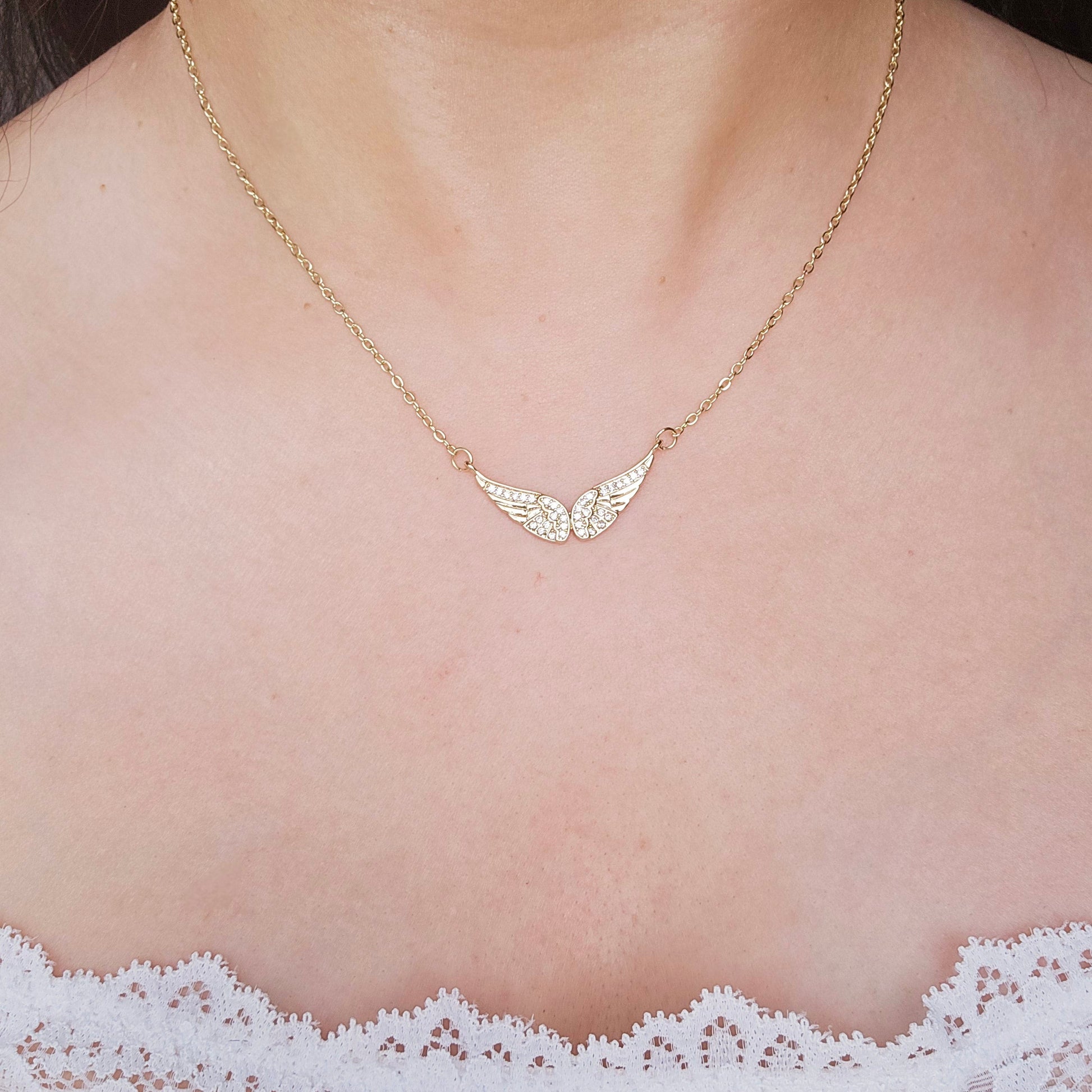 dainty gold angel wings necklace 