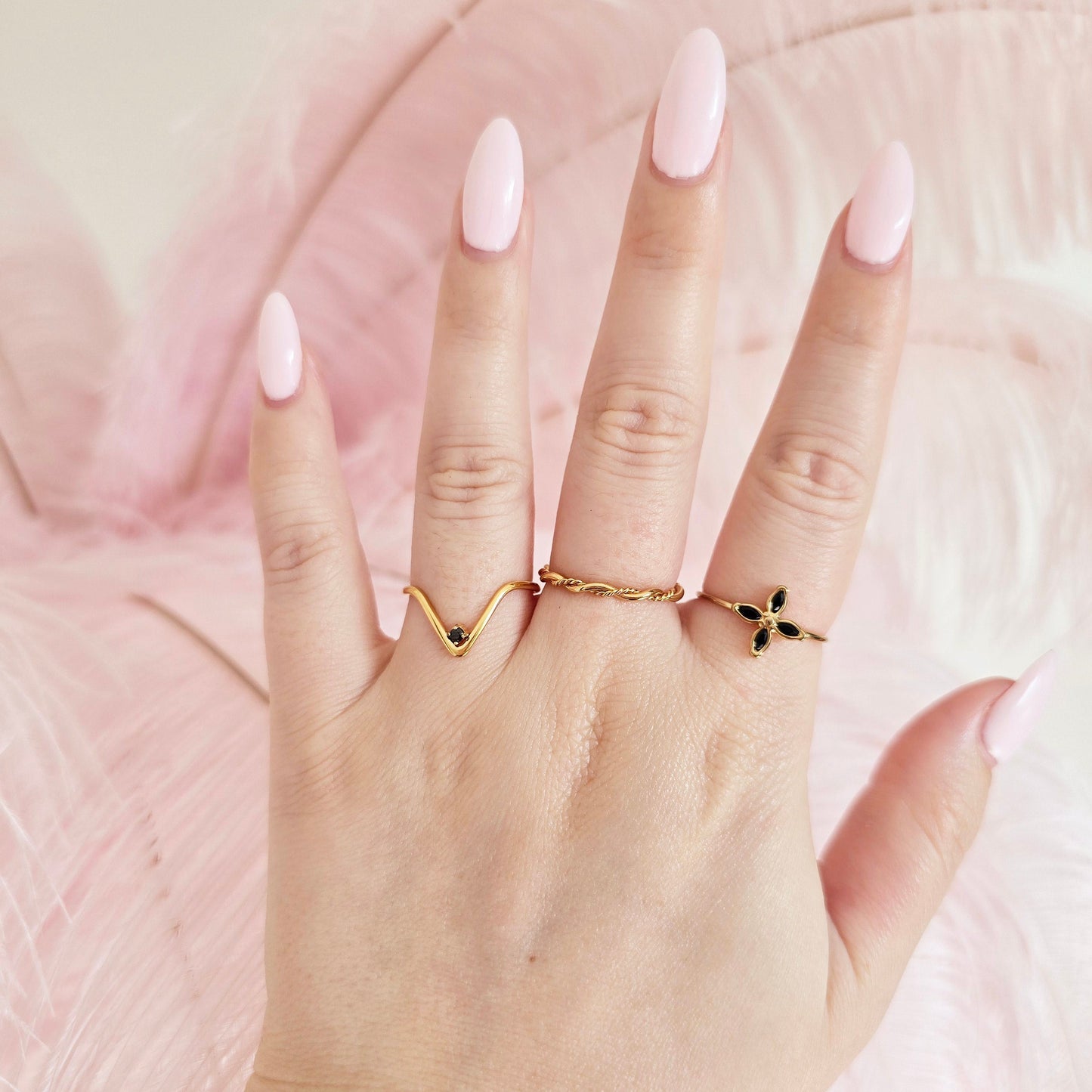 black dainty gold stacking rings