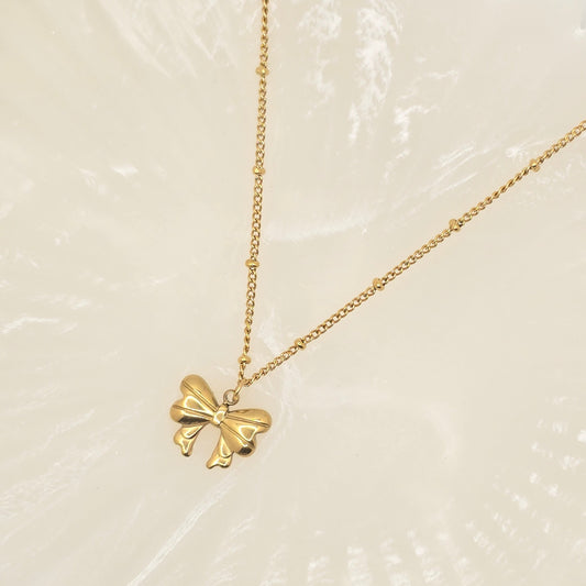 dainty gold bow necklace gift idea