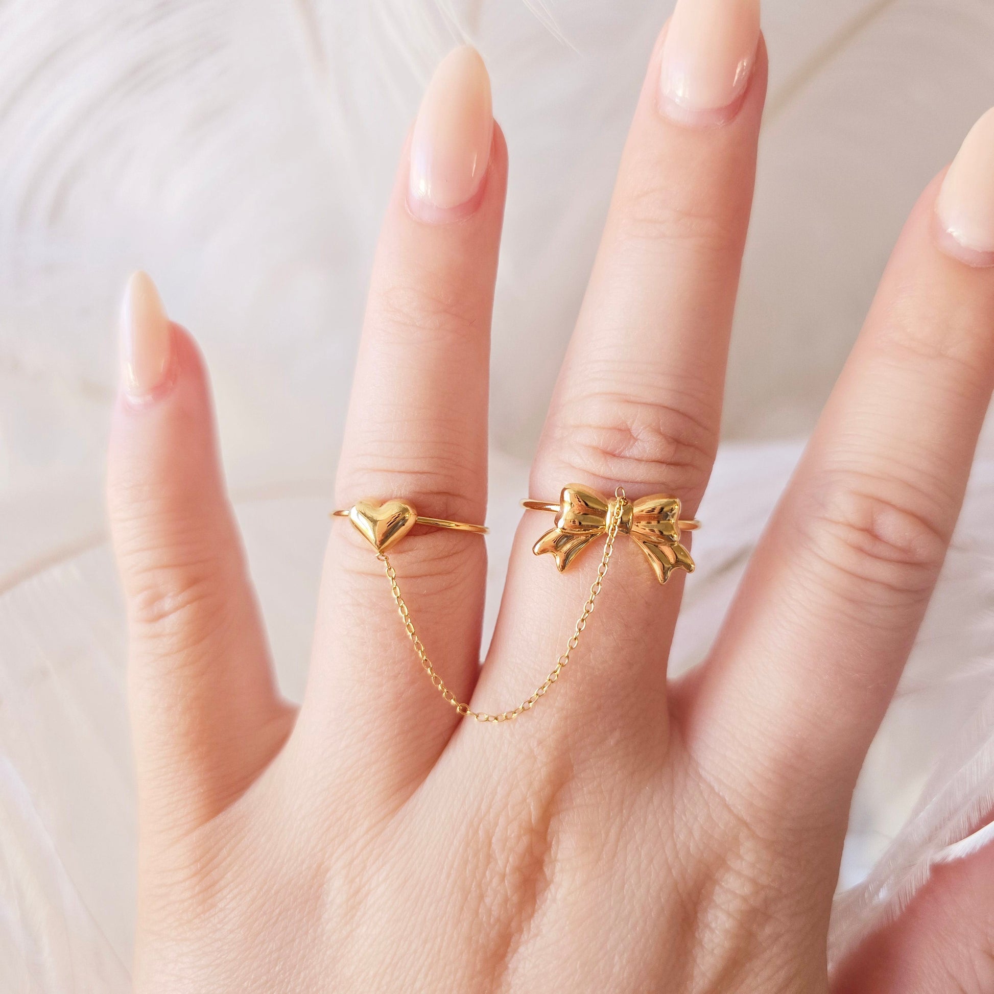 connected double gold rings