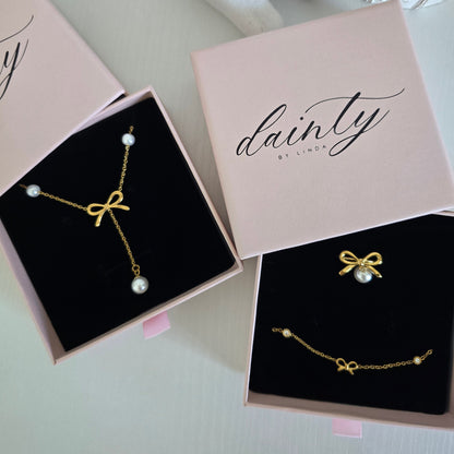 dainty gold pearl bow jewelry set