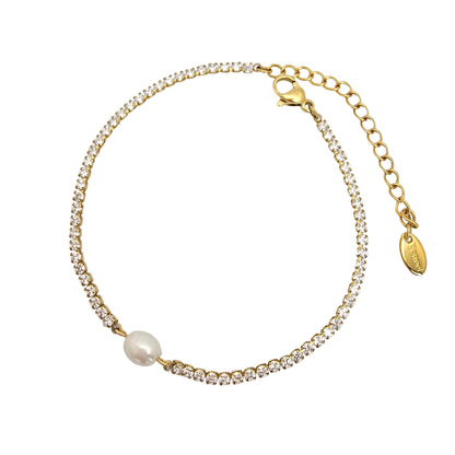 gold dainty tennis bracelet with pearl