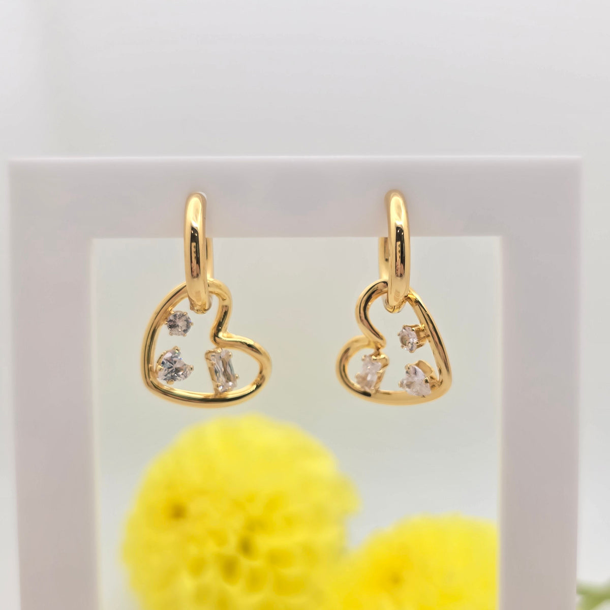 heart charm earrings floating diamond cz