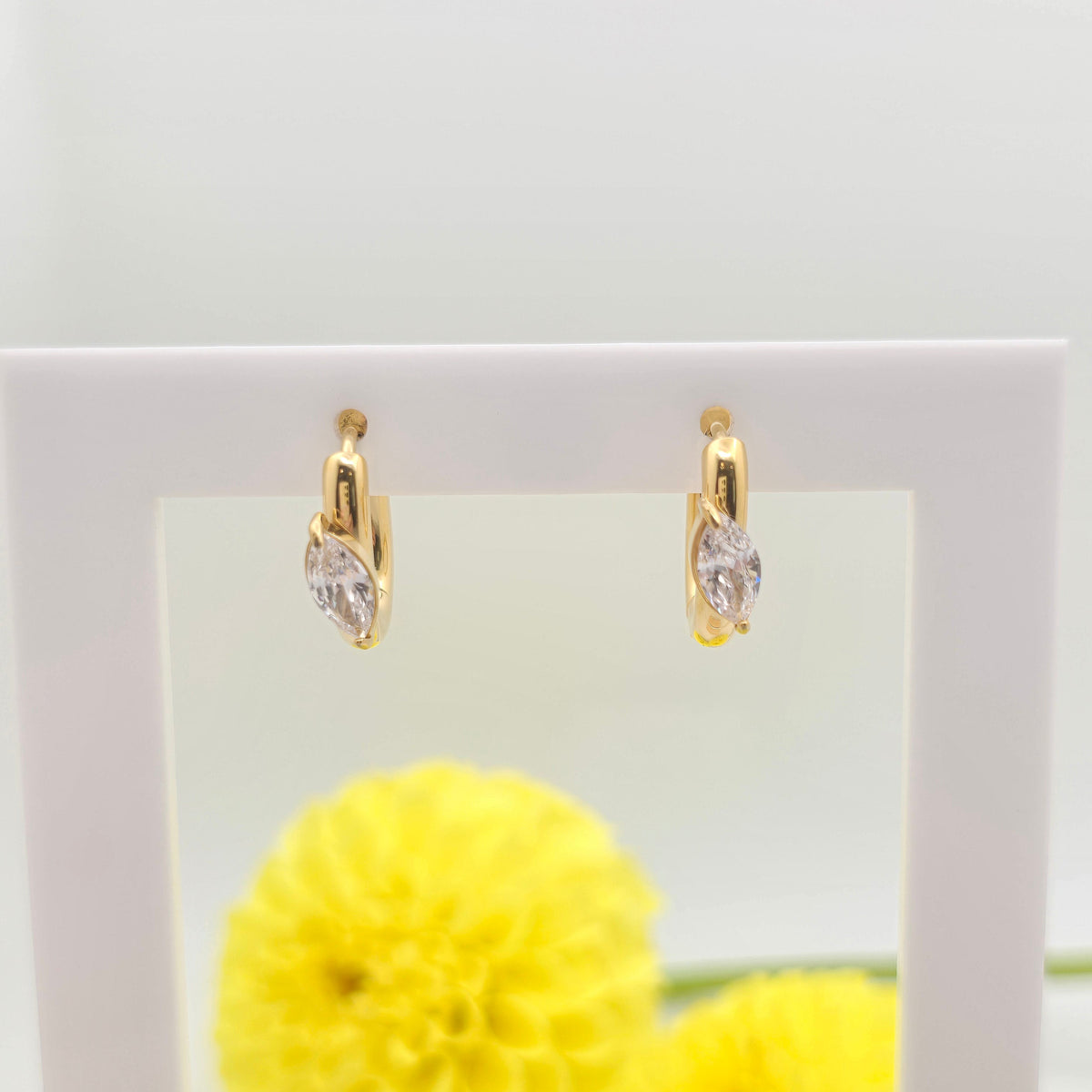 dainty luxe huggie earrings marquise diamond cz