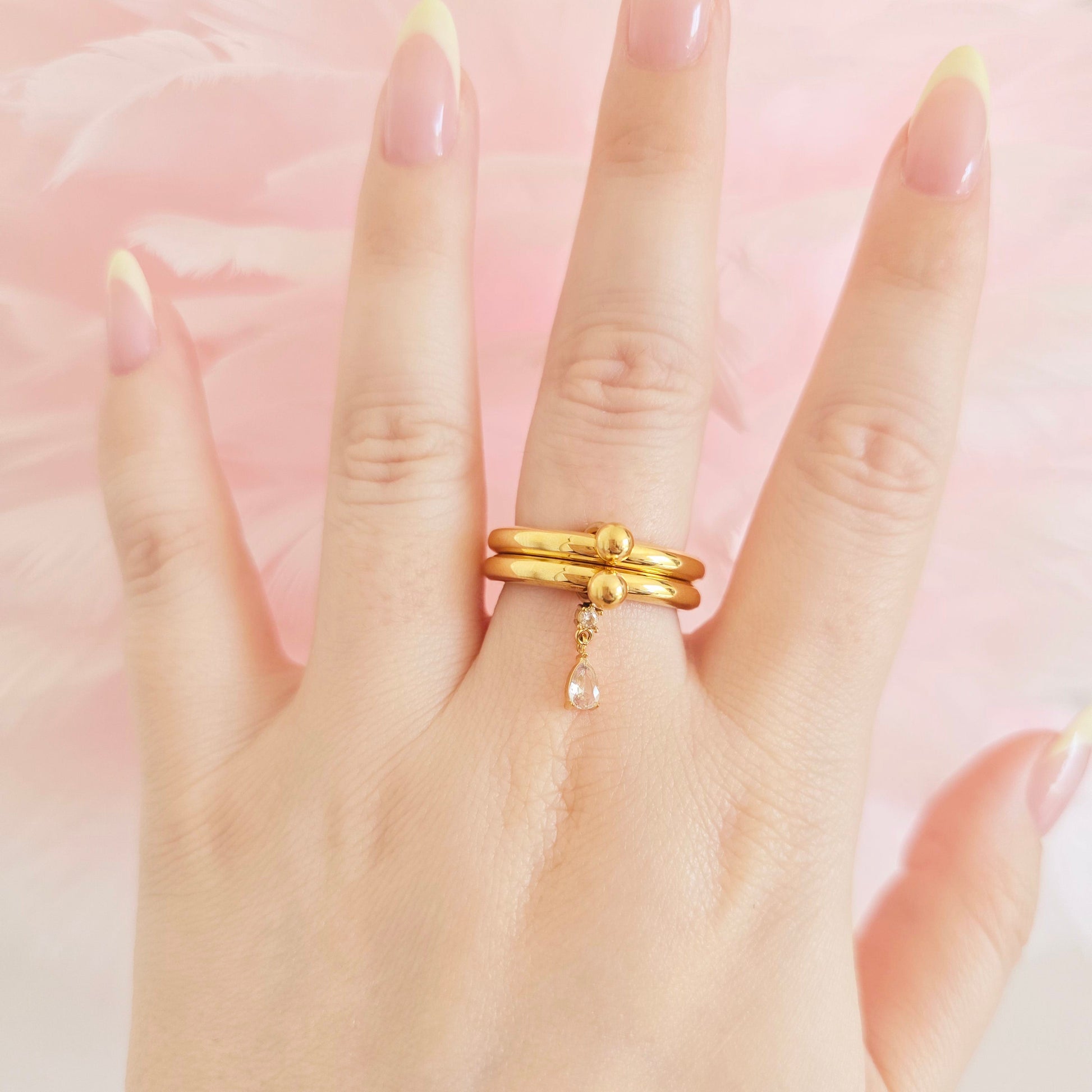 affordable gold rings with tiny pear charm