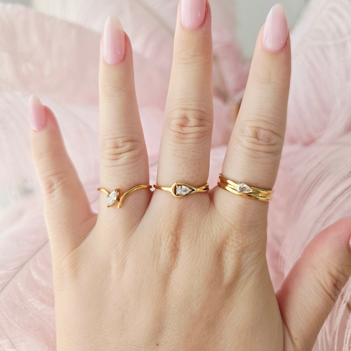 dainty gold cz rings stacked on gift idea