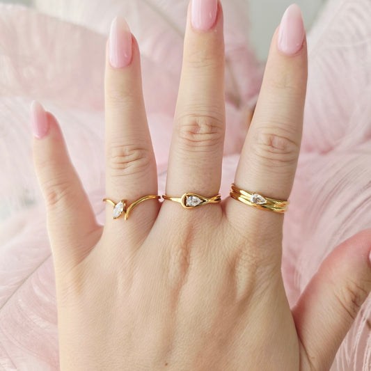 dainty gold cz rings stacked on gift idea