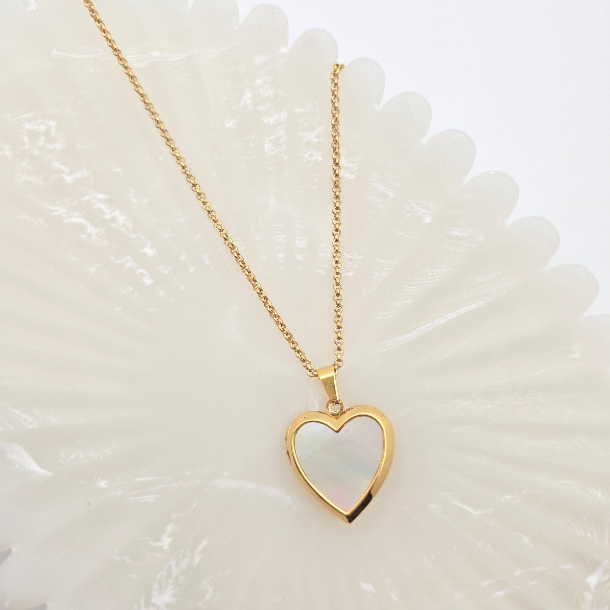 dainty gold mother of pearl heart locket