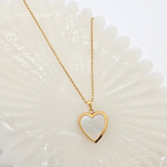 dainty gold mother of pearl heart locket