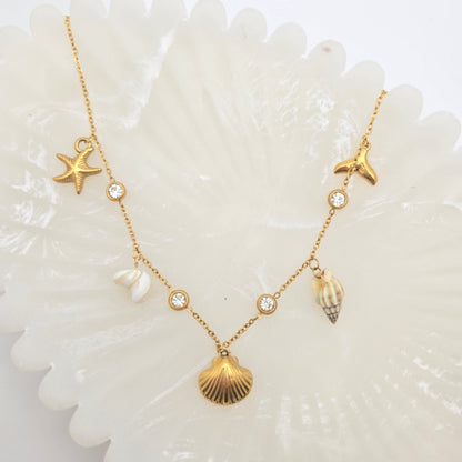 dainty gold charms necklace beach jewelry