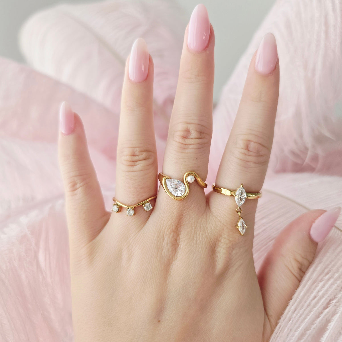 dainty gold waterproof pear diamond ring