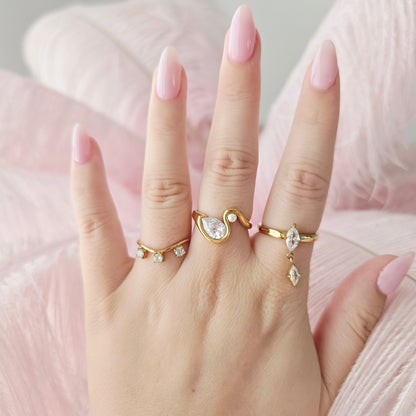dainty gold waterproof pear diamond ring