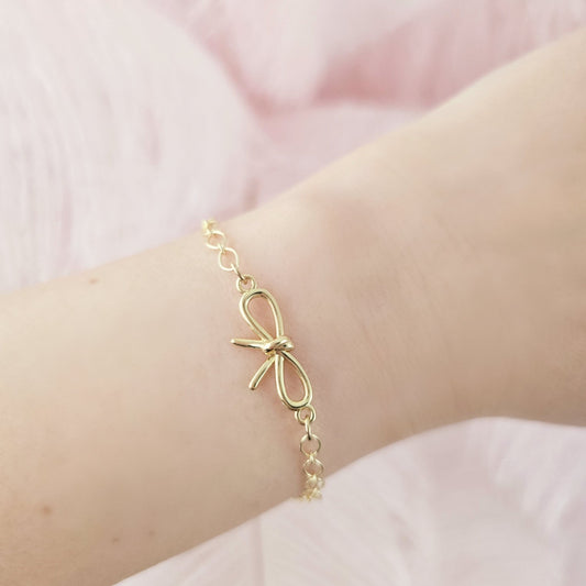 dainty gold bow bracelet girly stacking