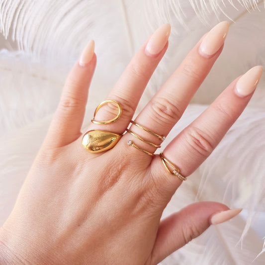 gold statement rings on