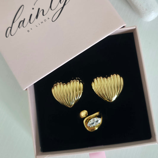 statement gold heart earrings marquise diamond ring